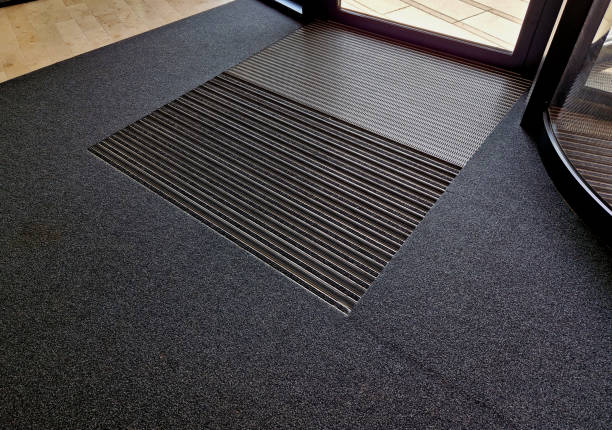 istock mat with felt filling and cassette brushes, gray aluminium. profiles embedded below the pavement level. replaceable felt brushes clean the shoes and soak up the water. the risk of slipping is reduced 1498688024