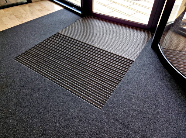 istock mat with felt filling and cassette brushes, gray aluminium. profiles embedded below the pavement level. replaceable felt brushes clean the shoes and soak up the water. the risk of slipping is reduced 1498688058