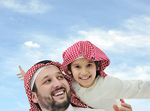 istock Arabic little kid boy with his father 149869505