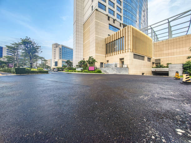 Asphalt ground background of modern construction after rain