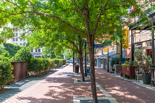 Dallas, Texas, USA. 2 June 2023. Tree Lined Plaza to Elm Street in Dallas with restaurants.