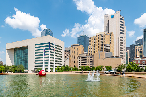 Dallas, Texas, USA. 2 June 2023. Dallas City Skyline on a sunny day with a fountain