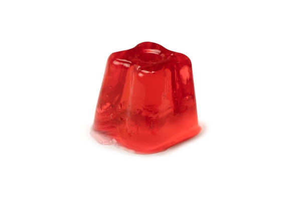 istock Sweet fruit jelly dessert isolated on white background. 1498703133