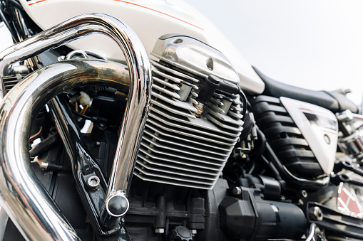 Moscow, Russia - May 04, 2019: Chrome headlights with direction indicators of Harley Davidson motorcycle closeup. Moto festival MosMotoFest 2019