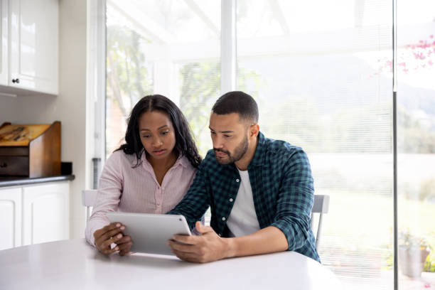 istock Couple getting bad news while talking on a video call 1498704751