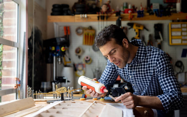 istock Man working on a DIY carpentry project at home 1498704796