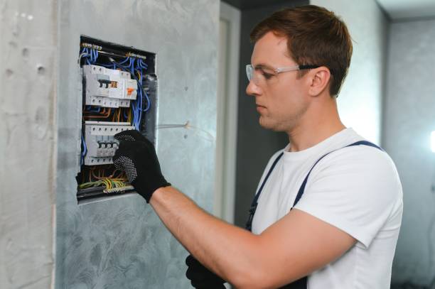 istock Portrait of an electrician at work 1498707688
