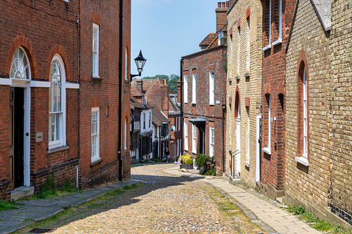Rye, England UK - Jun 13, 2023: Old street of Rye town with traditional buildings.