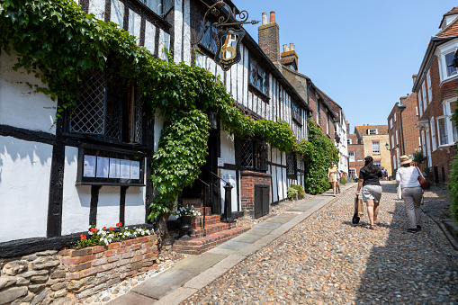 Rye, England UK - Jun 13, 2023: Old street of Rye town with traditional buildings.