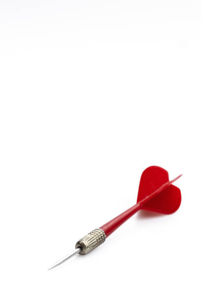 istock Red darts Isolated on white background, goal setting concept for success. 1498716234
