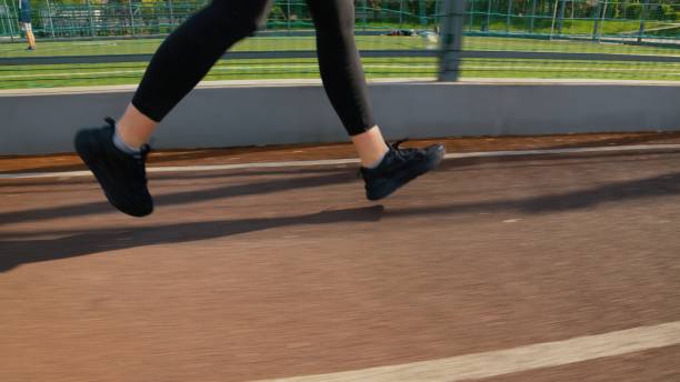 istock Someone is engaged in a run on the athletic field 1498717490