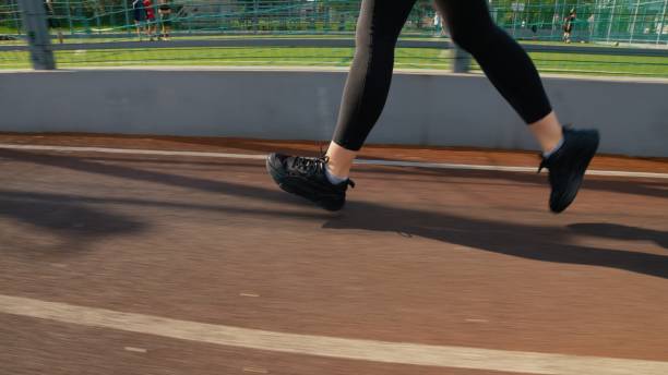 istock Person is running on the athletic field 1498717556