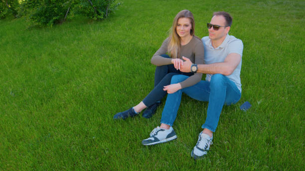 Free Stock Photo of Man Sitting on Ground Holding Hands Together ...