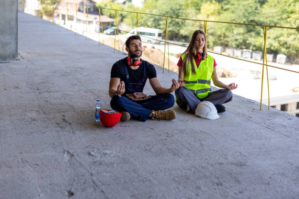 istock A Young Couple of Workers are Resting During a Work at Building Site. 1498718299