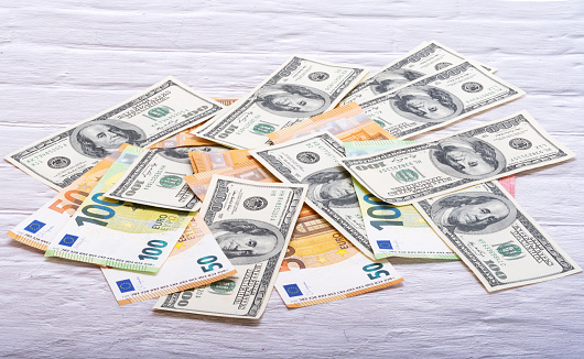Stacks of euro banknotes. Stacks of 70 thousand euro banknotes, bundles of 10 euro, 20 euro and 50 euro banknotes.\nThis image is part of a money concepts series.