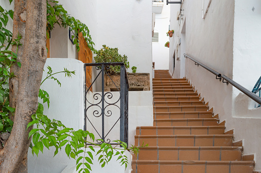 Staircase in narrow street of town