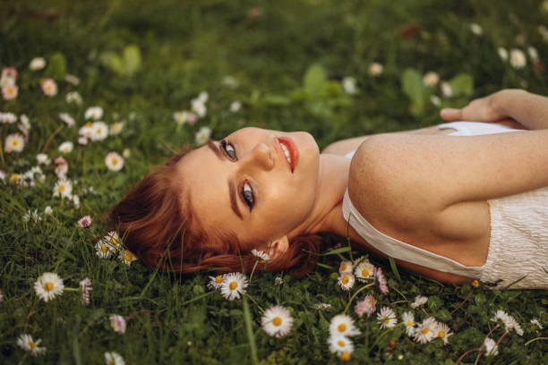 istock Smiling young woman enjoying summer 1498724098