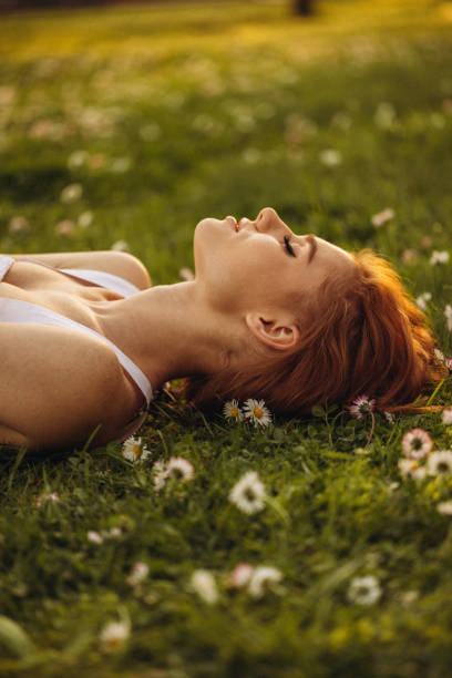 istock Smiling young woman enjoying summer 1498724137