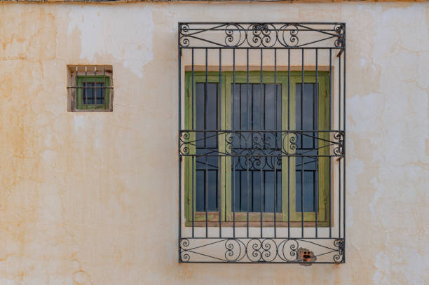 istock Andalusian town facade with window 1498724255