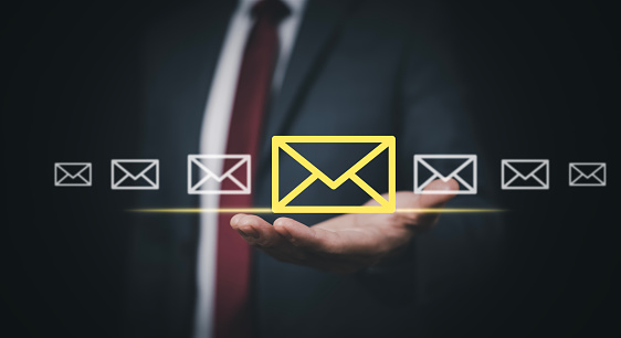 Business people hand-holding communication icons, letter icons, email icons, and newsletter email and protect your personal information or spam mail, Customer service call center contact us.
