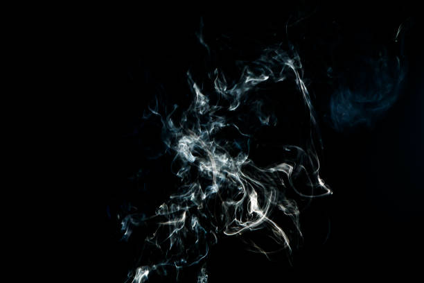 istock Smoke effect texture. Isolated background. Black and dark backdrop. Smokey fire and mistic effect. 1498726760