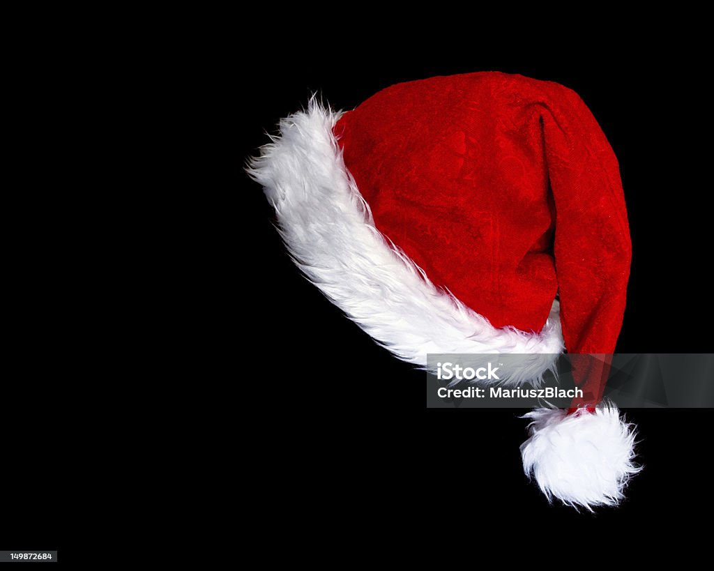 santa's hat santa's hat over black background Santa Hat Stock Photo