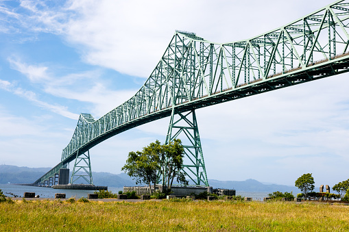 The Astoria–Megler Bridge,  a four mile steel cantilever truss bridge spanning the lower Columbia river from Washington state to Oregon, USA.