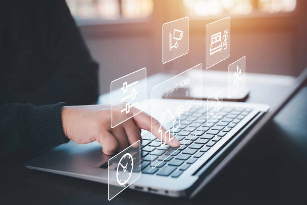istock Hand using AI smart tablet with smart home app on the room, circular interface of the smart home automation assistant on the virtual screen and user touches the button, smart home digital interface 1498728015