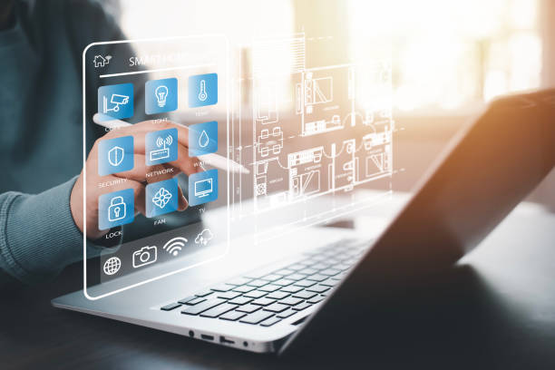 istock Hand using AI smart tablet with smart home app on the room, circular interface of the smart home automation assistant on the virtual screen and user touches the button, smart home digital interface 1498728376