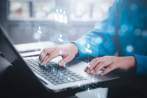 istock Customer Relationship Management ,Businessman using laptop with human global structure , Data exchanges development. customer service, social media, digital marketing online,Social Internet network,HR 1498728456