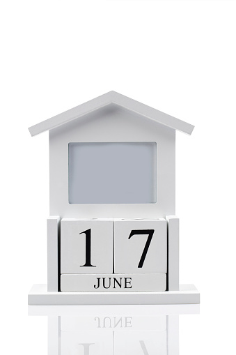 White vintage wood block calendar present date 17 and month June