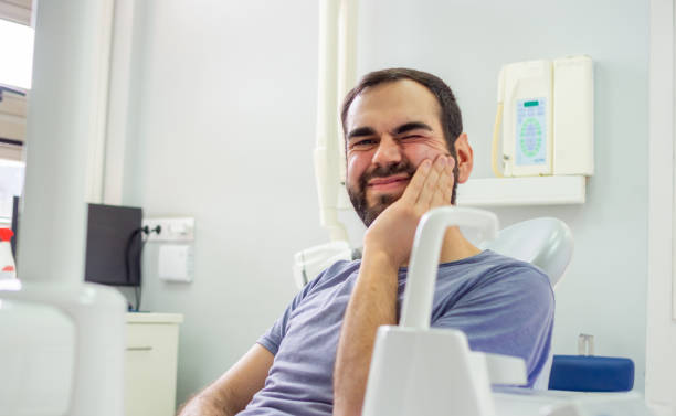 istock Patient at the denstist 1498731709