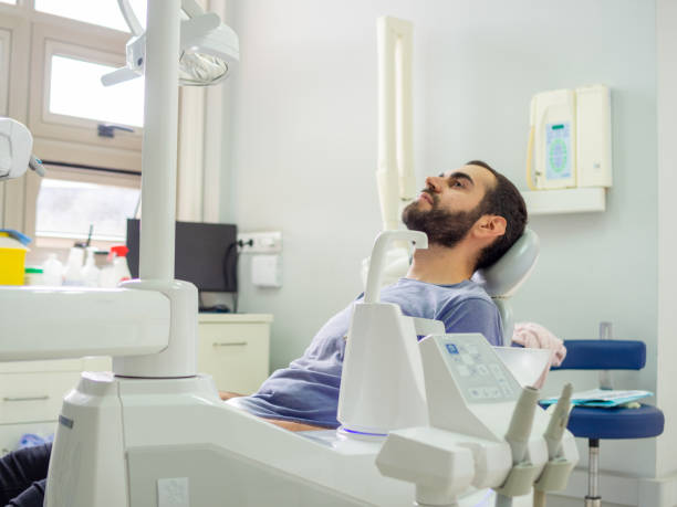 istock Patient at the denstist 1498733275