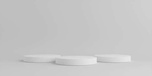 istock Product Podium - Three White Podiums, Pyramid Formation, White Background. 3D Illustration 1498733872
