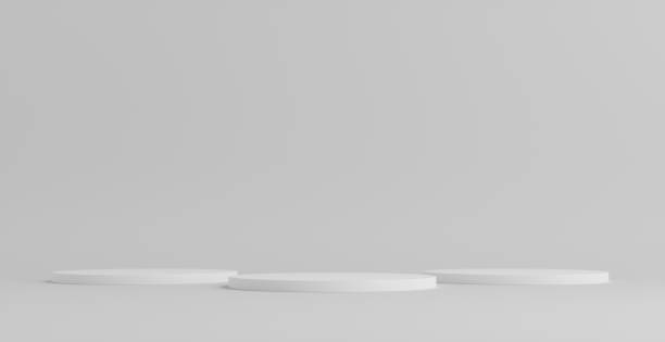 istock Product Podium - Three White Podiums, Pyramid Formation, White Background. 3D Illustration 1498733900
