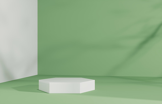 Product Podium - White Hexagonal Podium, Shadowy Green Background. 3D Illustration