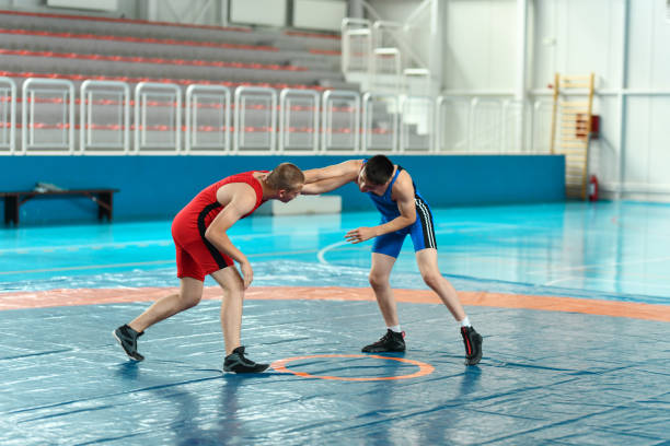 istock Wrestling Match Between Two Male Competitors 1498738159