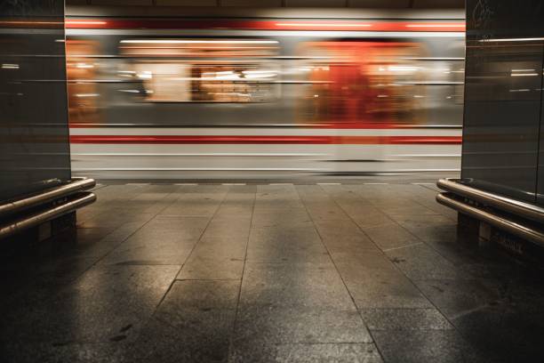 istock a train pulls into a subway station in motion on a rainy day 1498742407