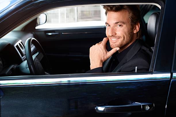 istock Smiling man in limousine 149874377