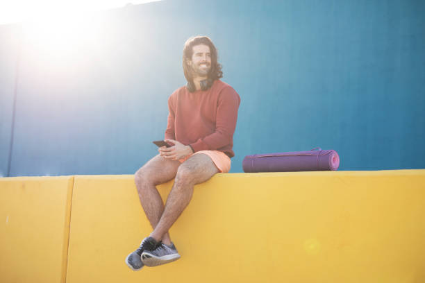 istock Portrait of handsome man resting after training outside. 1498746713