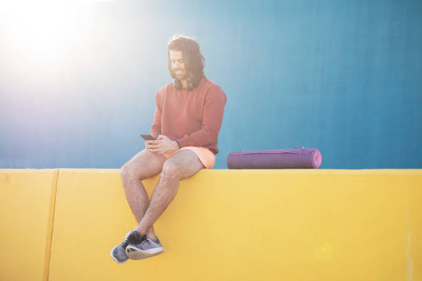 istock Portrait of handsome man resting after training outside. 1498746720