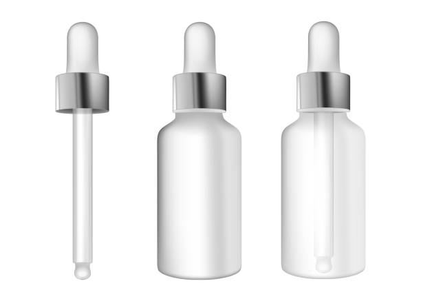 istock Set of dropper bottles for cosmetic serum. Cosmetic container mockups. Serum bottle with pipette isolated on white background. Collagen essence treatment. 3d vector. 1498757852