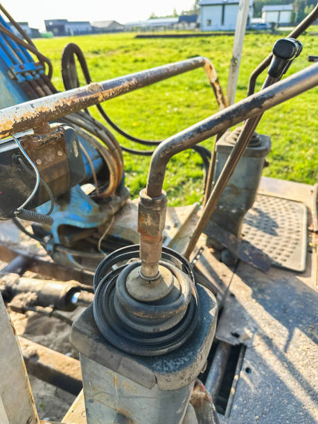 istock Closeup of details inside old excavator on a construction site 1498759755