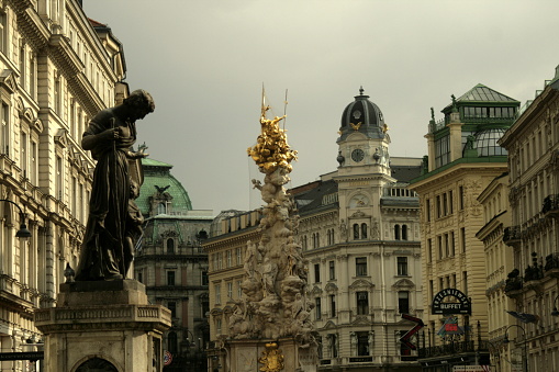 Taken on 03/01/2015 The Baroque monument on Graben Street in Vienna, Austria. Producers of the statue: Mathias Rauchmiller, Lodovico Ottavio Burnacini, Paul Strudel, Tobias Kracker, and Johann Ignaz Bendl. It was built in 1679 in tribute to the Plague epidemic. The height of the statue is 21 meters.