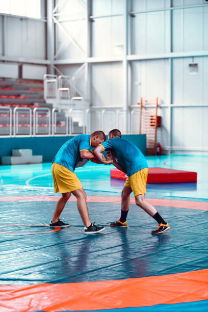 istock Arm Drag In Progress By Two Young Wrestlers 1498765276