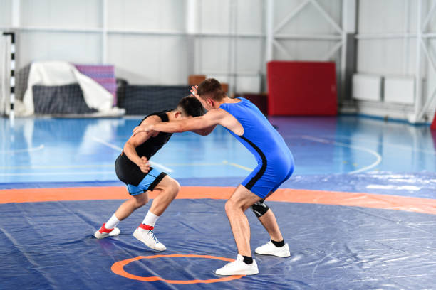 istock Wrestler About To Perform A Takedown Against Opponent 1498765539