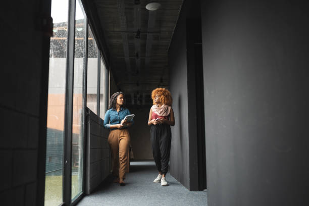 istock Co-workers arrived at the company 1498769352
