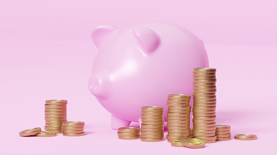 Piggy bank and golden coins isolated on pink background. Savings, financial business and economy concept.