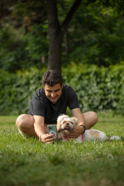 istock A man is taking a selfie with his dog. 1498770955