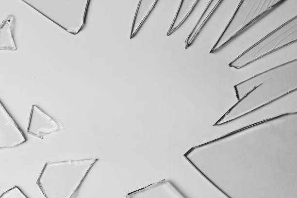 istock Broken glass pile pieces of texture and background isolated on white, cracked window effect. Emergency condition. 1498772244